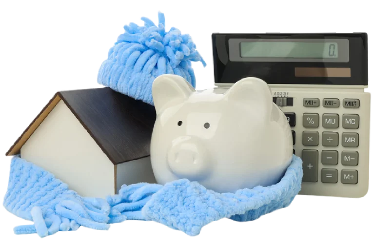 Piggy bank wrapped in a blue scarf beside a house model and calculator, symbolizing budget-friendly strategies for local moves in Denver.